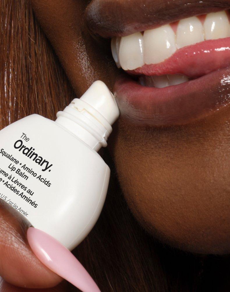 Peron applying Squalane Amino Acids Lip Balm