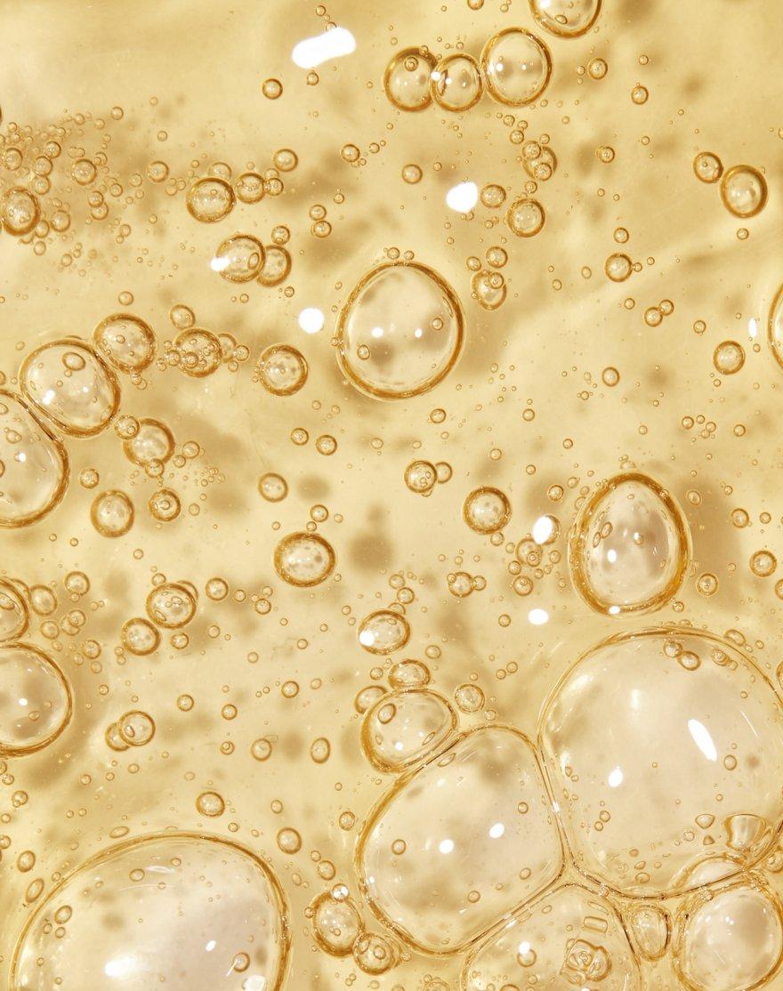 Close up crop of the texutre of Caffeine Solution 5% + EGCG serum