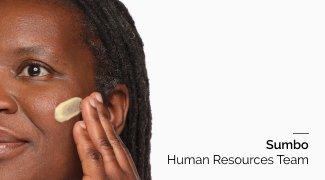 Person applying Retinal 0.2% Emulsion on skin