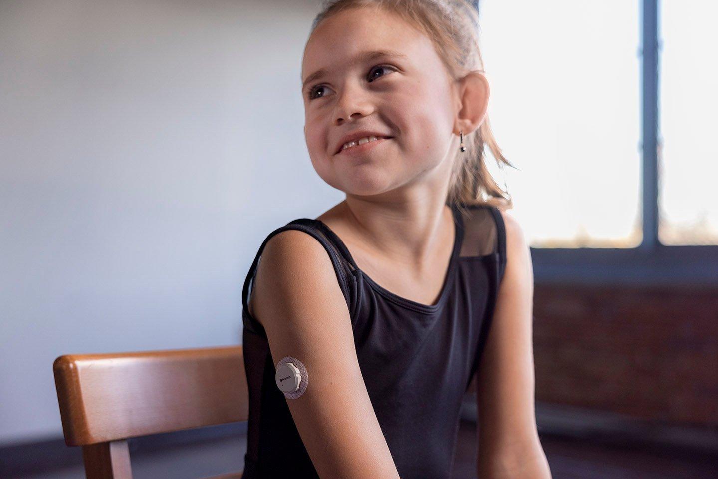 Dexcom teen warrior applying the Dexcom G7