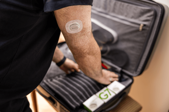 Dean packing his bag with G7 while wearing sensor