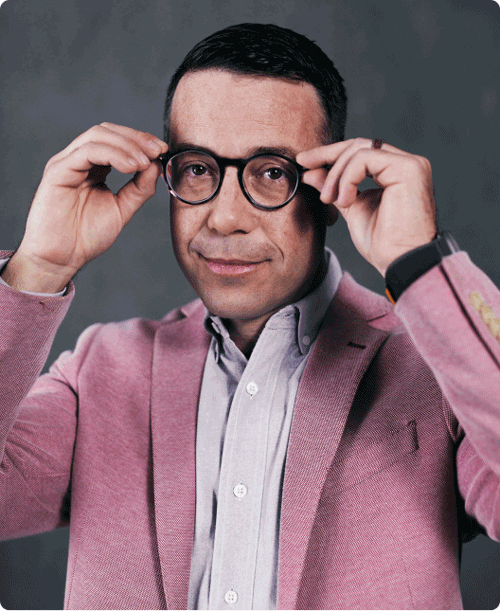 Man adjusting glasses