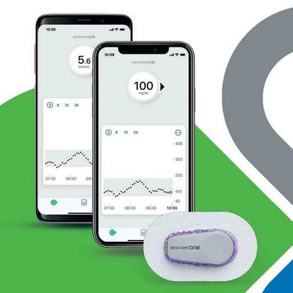 Two smartphones showing Dexcom ONE app glucose values in mmol and mgdl