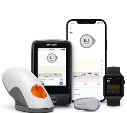 Photo of Dexcom G6 components including auto applicator, sensor and transmitter and display device.