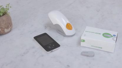 Dexcom ONE product with receiver and box - Video thumbnail