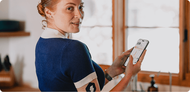 Woman on her phone looking to the side