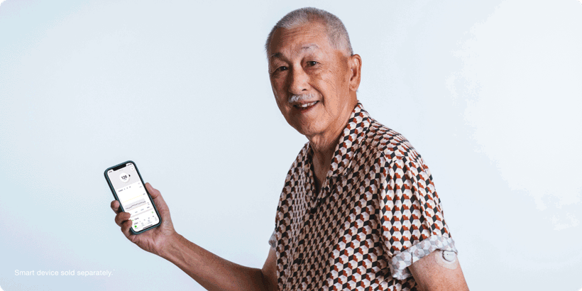 Arnold Choy showing readings on his phone