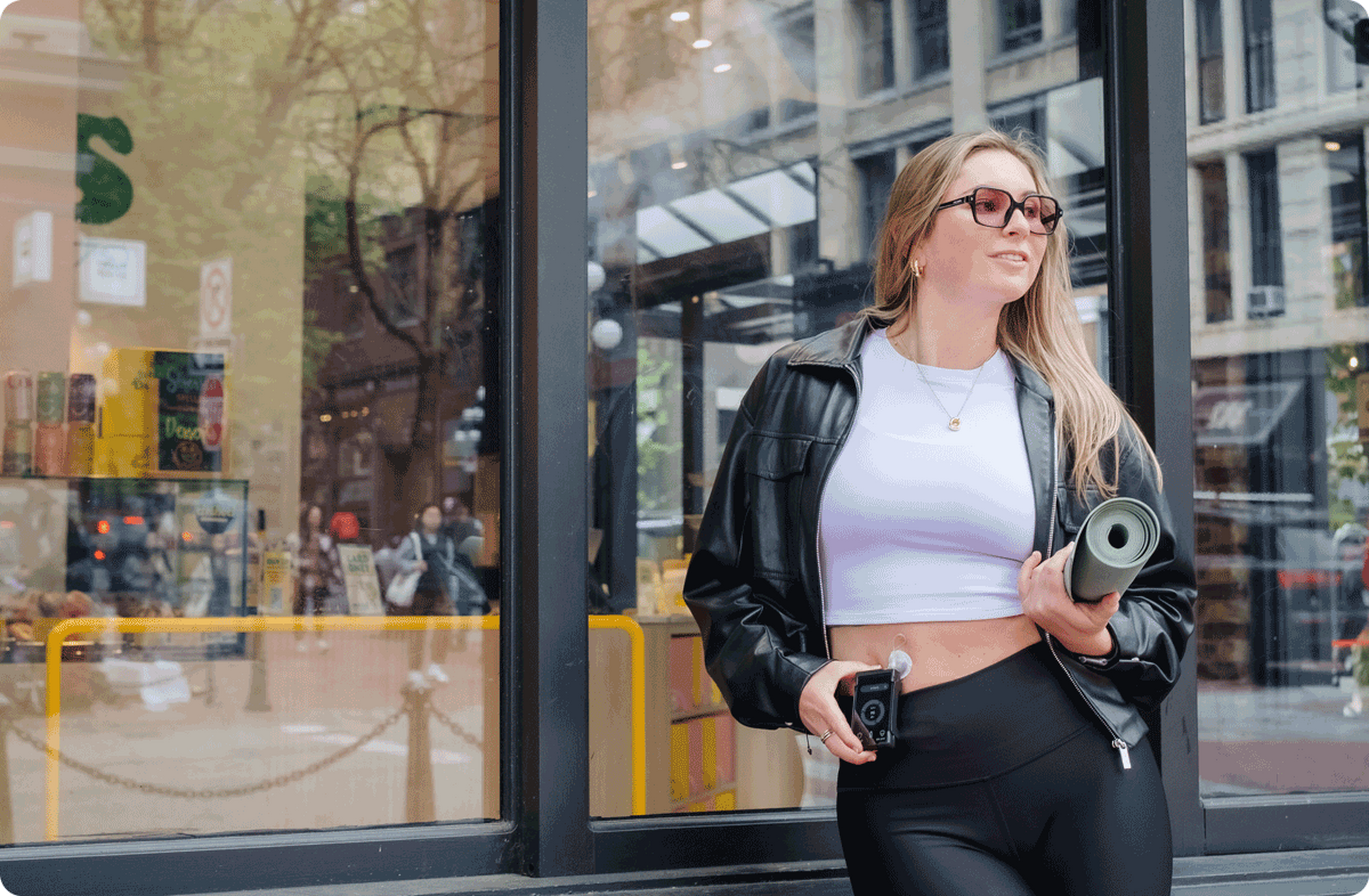 Woman showcasing Beta Bionics product