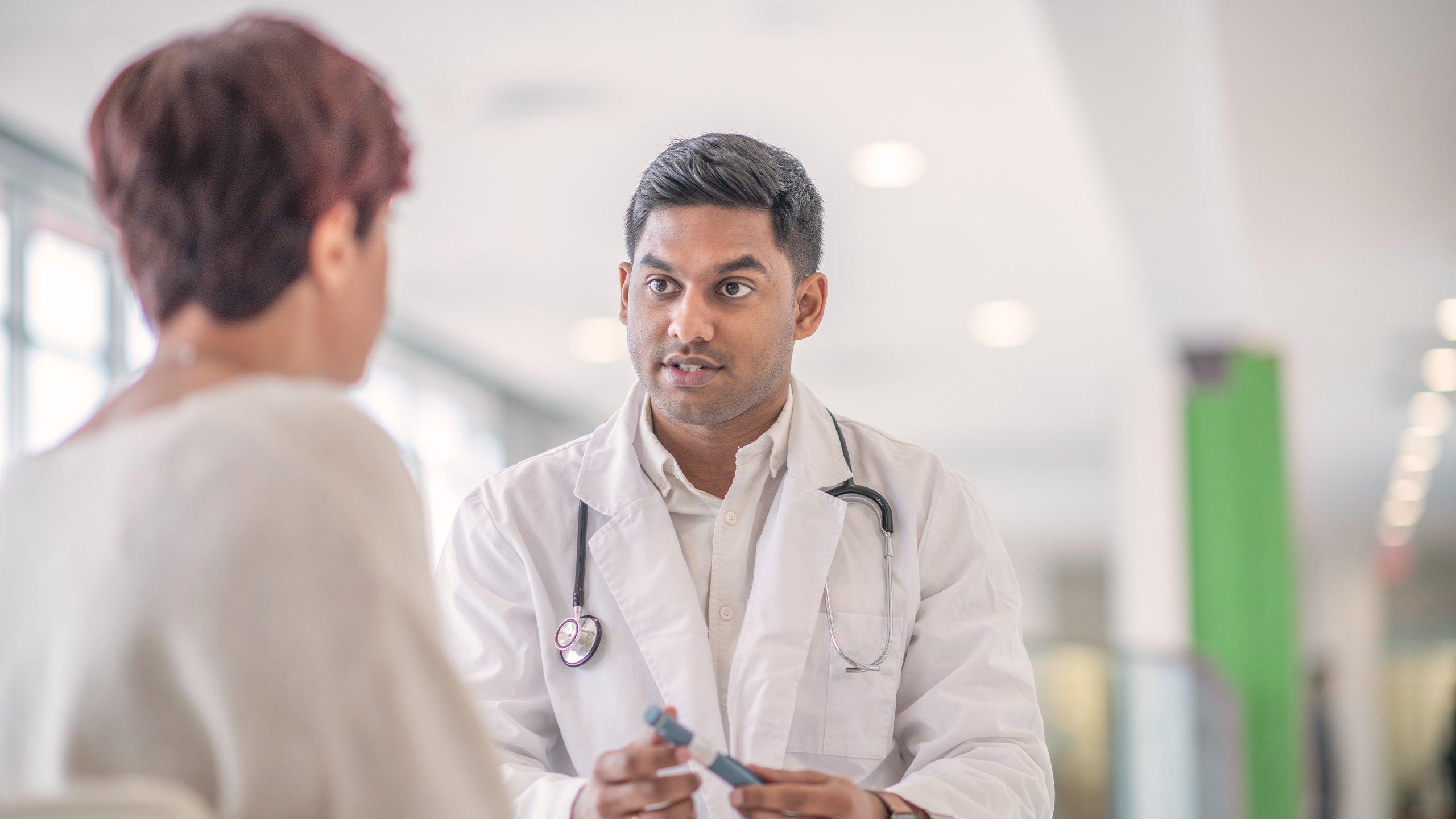 Doctor giving a diabetes diagnosis