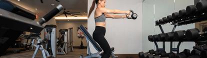 woman working out with the dexcom sensor on her arm