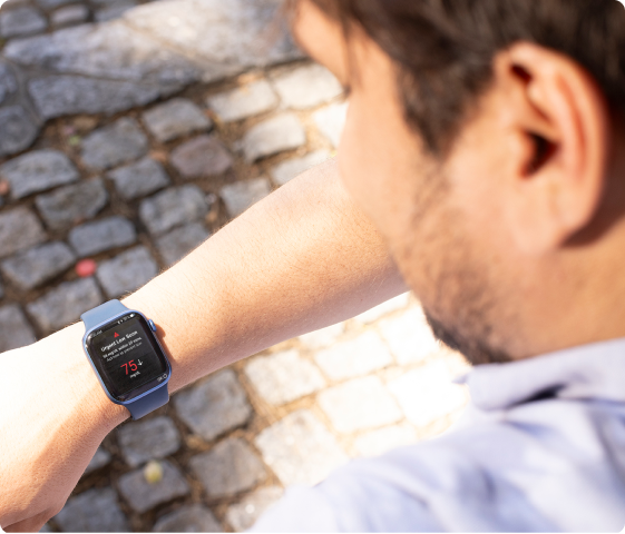 Man checking an urgent low alerts on smart watch