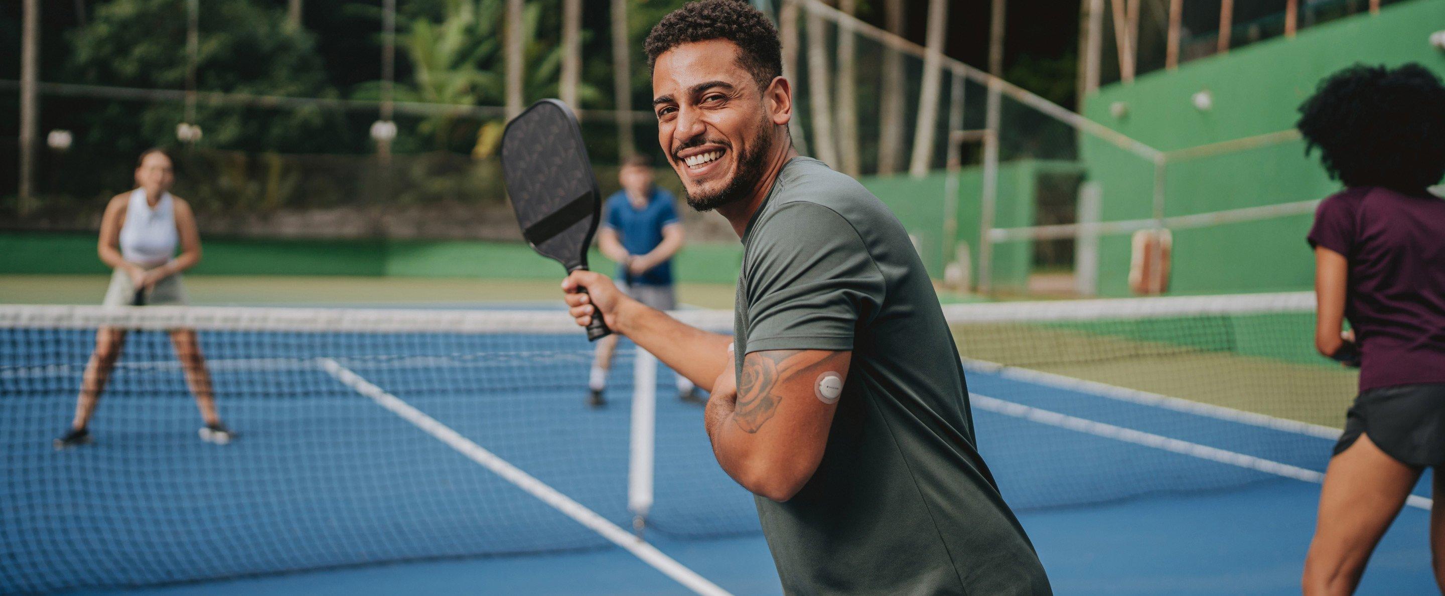 Friends playing pickle ball