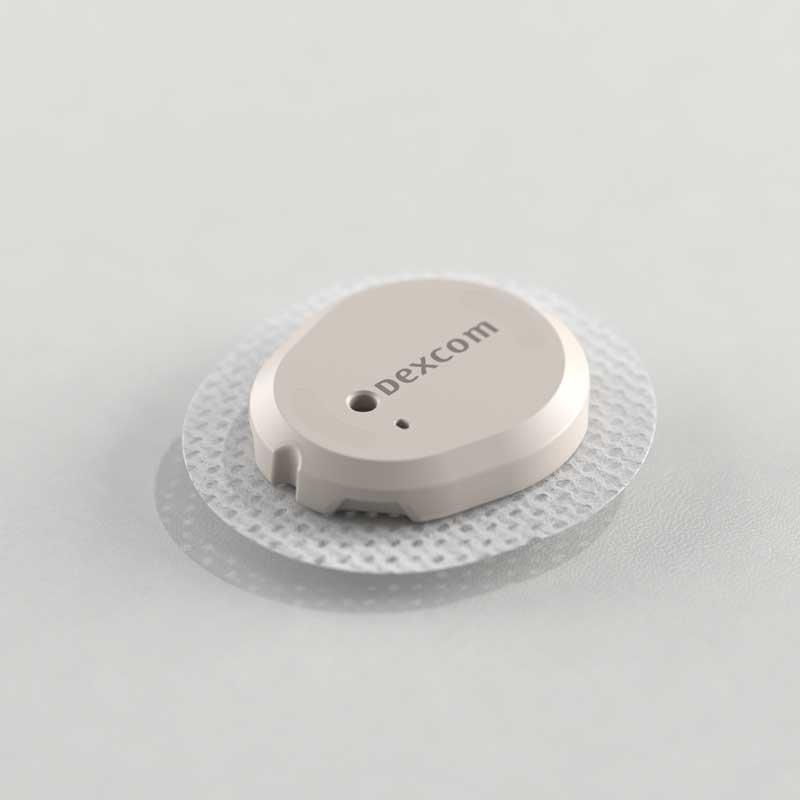 A medical professional is showing a patient Clarity information on a smart device