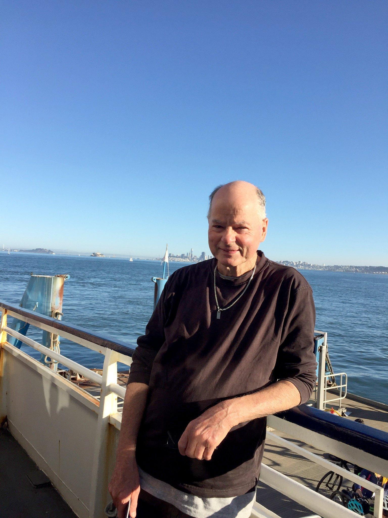 Tim smiling on a boat