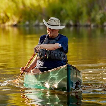 Dexcom Warrior Brad canoeing with Dexcom G6 on his arm