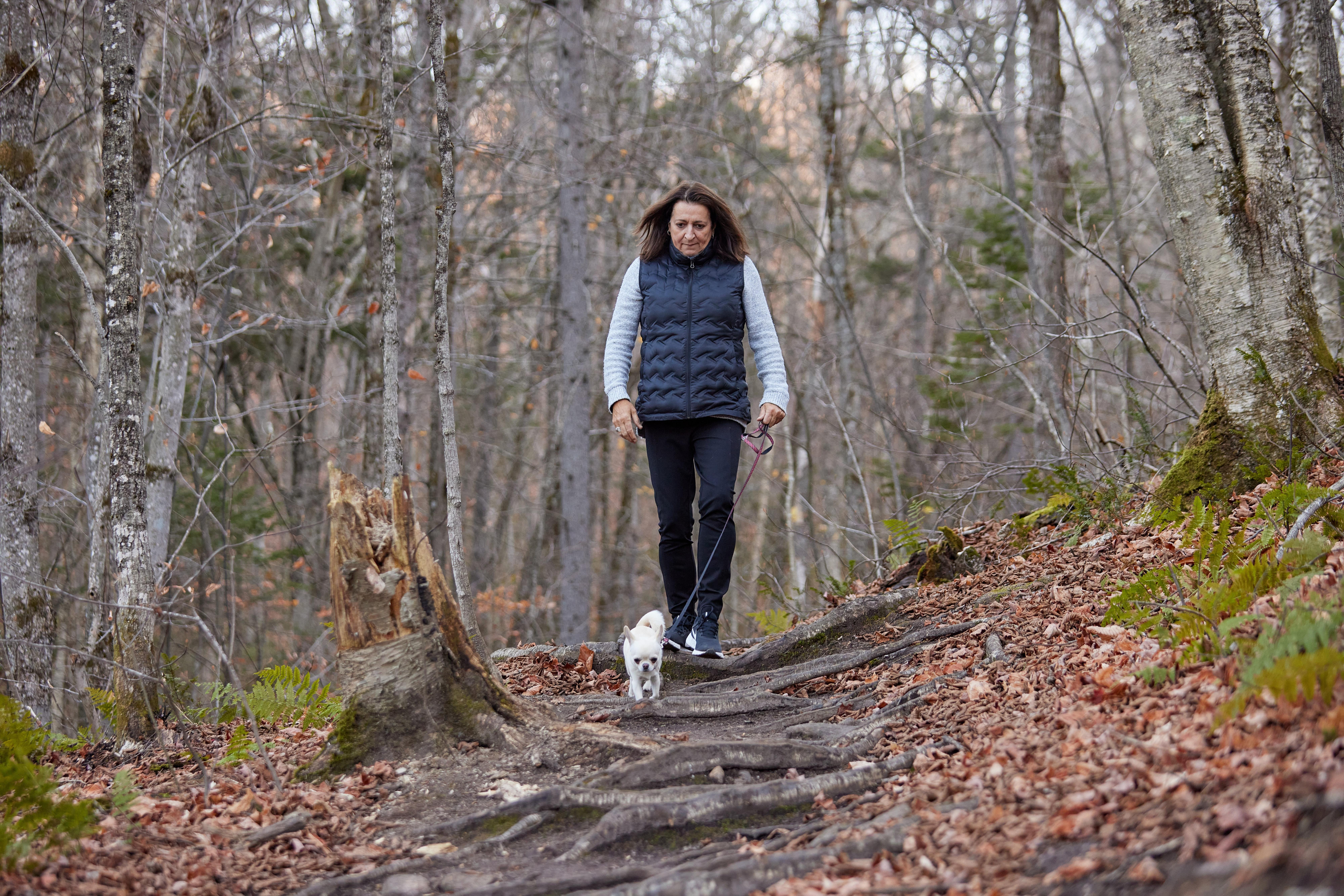 Dexcom warrior Marie Chantal walking with her dog