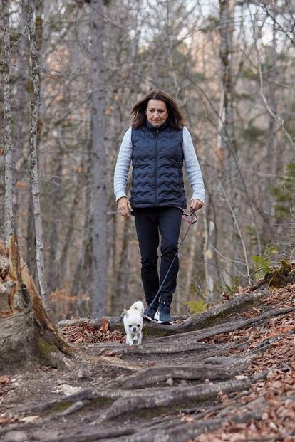 Dexcom warrior Marie Chantal walking with her dog
