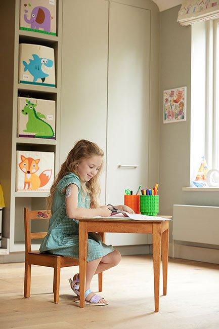 Girl with diabetes at school wearing a diabetic patch
