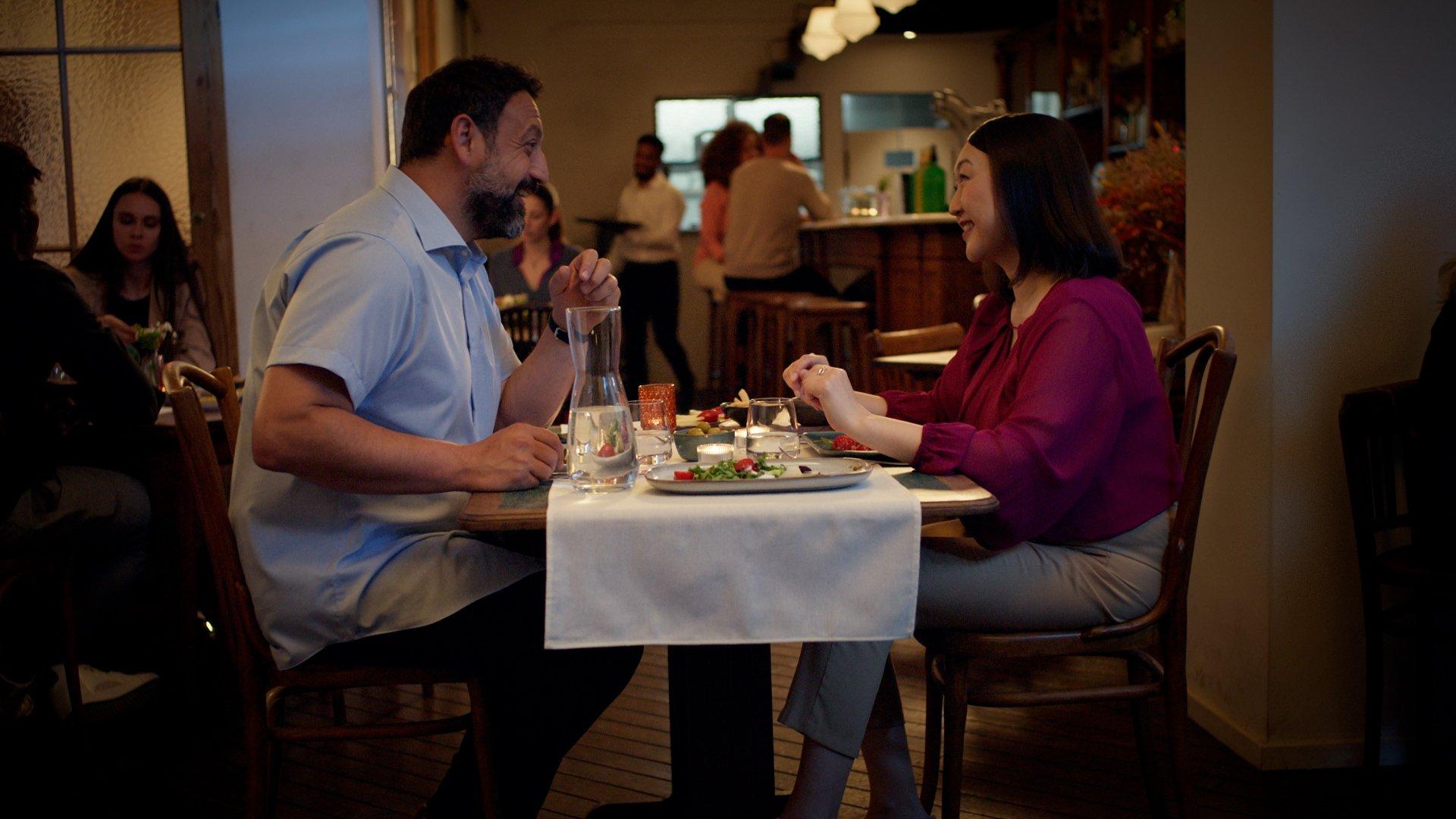 Man holding bicycle handles wearing a Dexcom Continuous glucose monitoring device