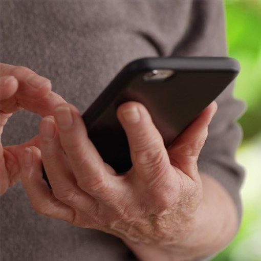 A person scrolling on a smartphone