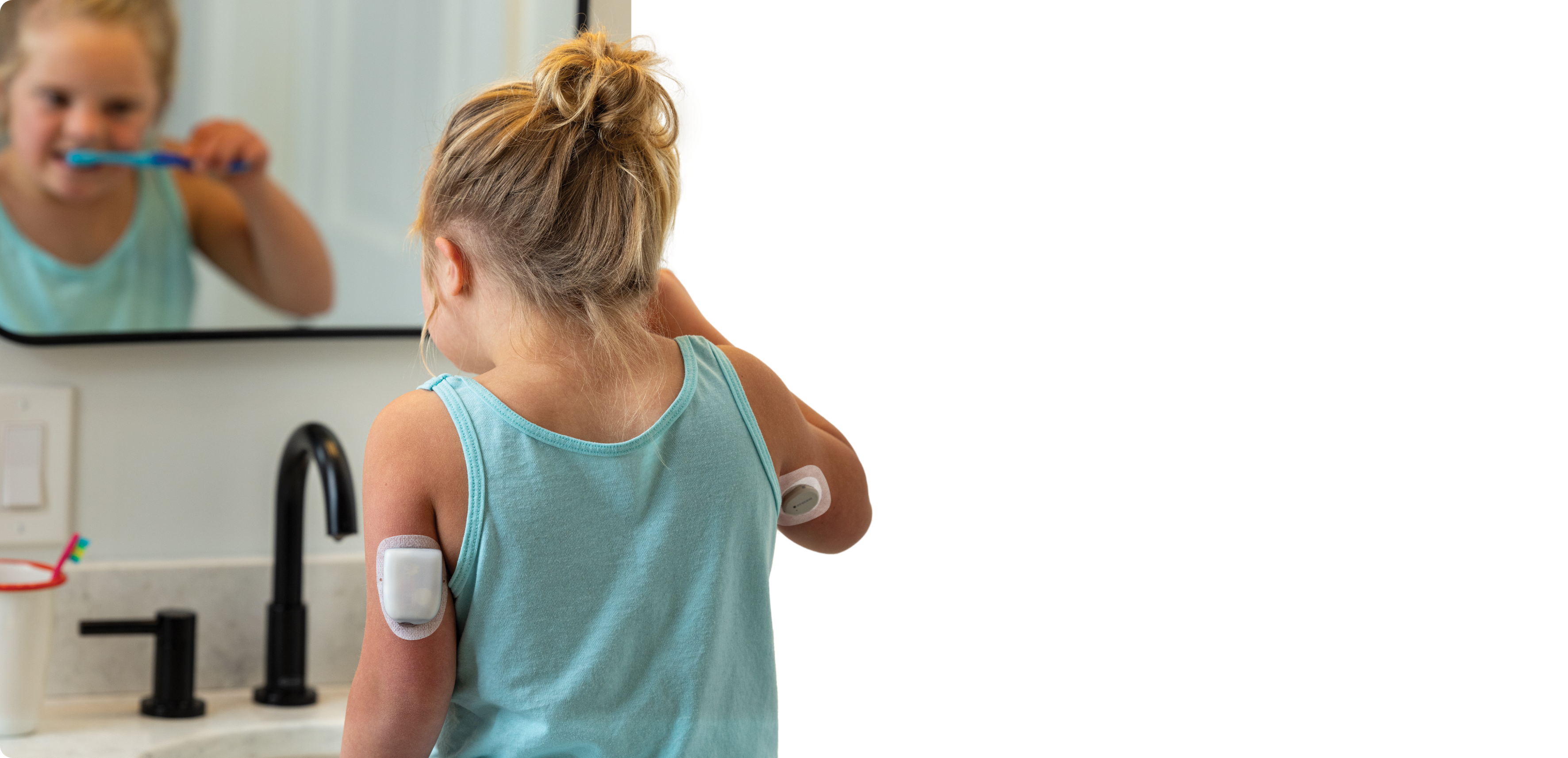 Girl brushing teeth wearing the Dexcom G6 and Omnipod 5