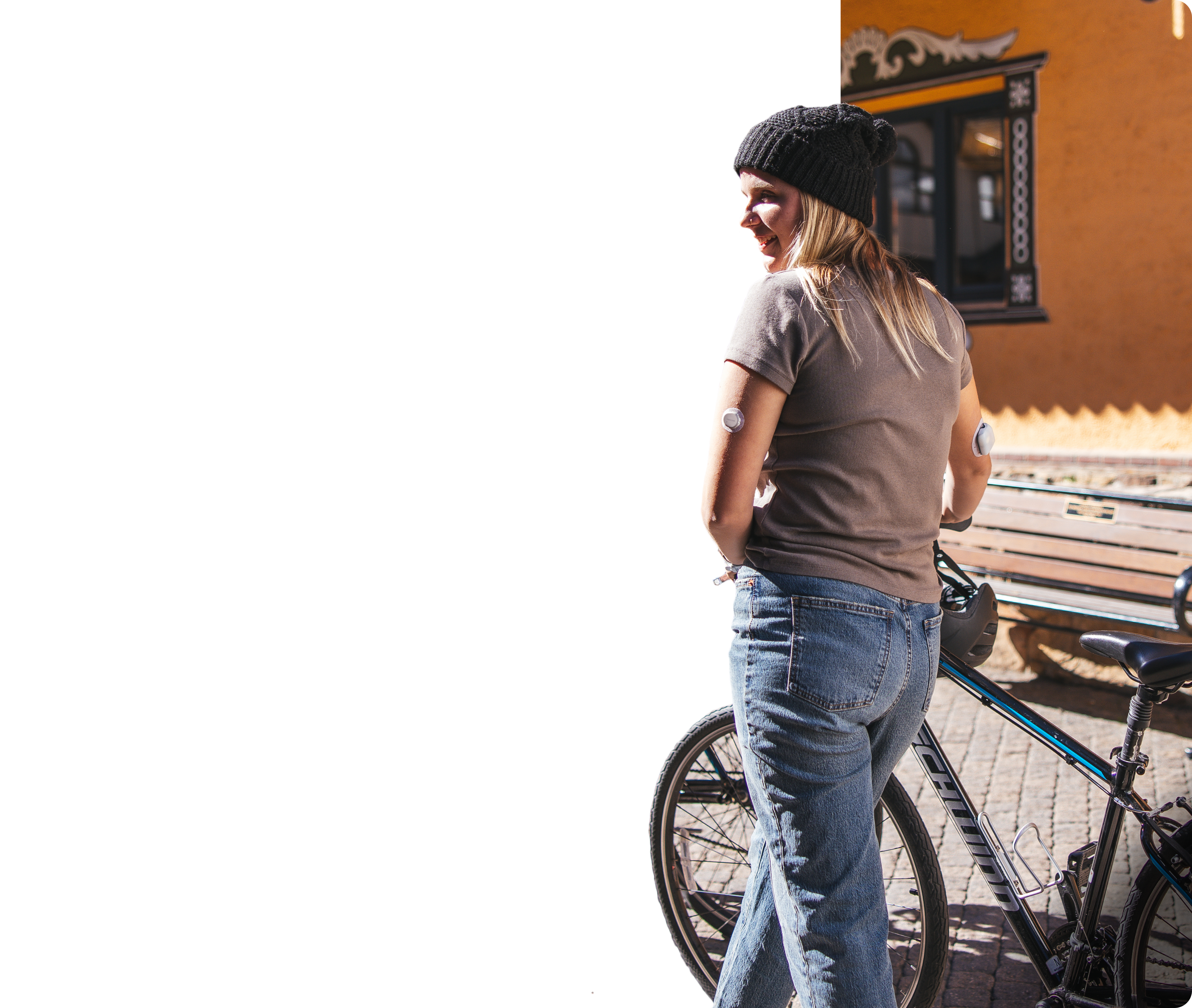 Girl walking along a path wearing the Dexcom G7 and Omnipod 5
