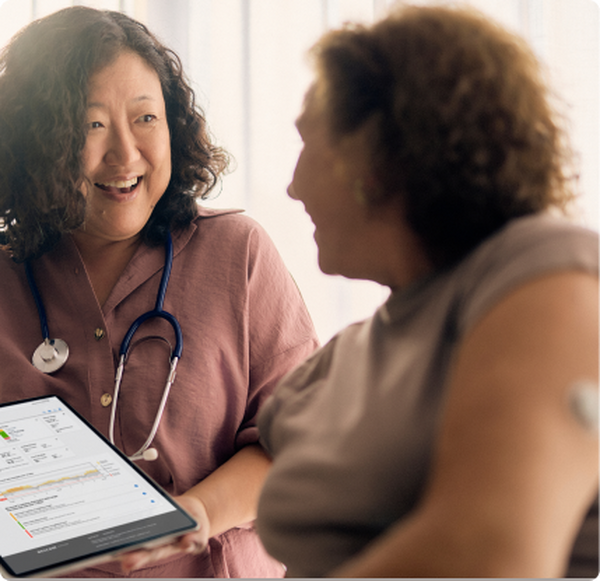 Woman talking to her doctor about her glucose levels
