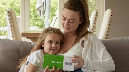 A mother and daughter with the Dexcom G6 CGM system