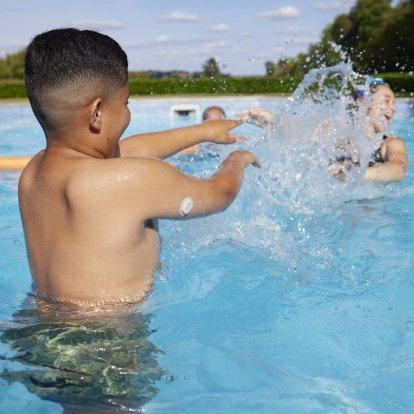 Young  person wearing a Dexcom sensor at school