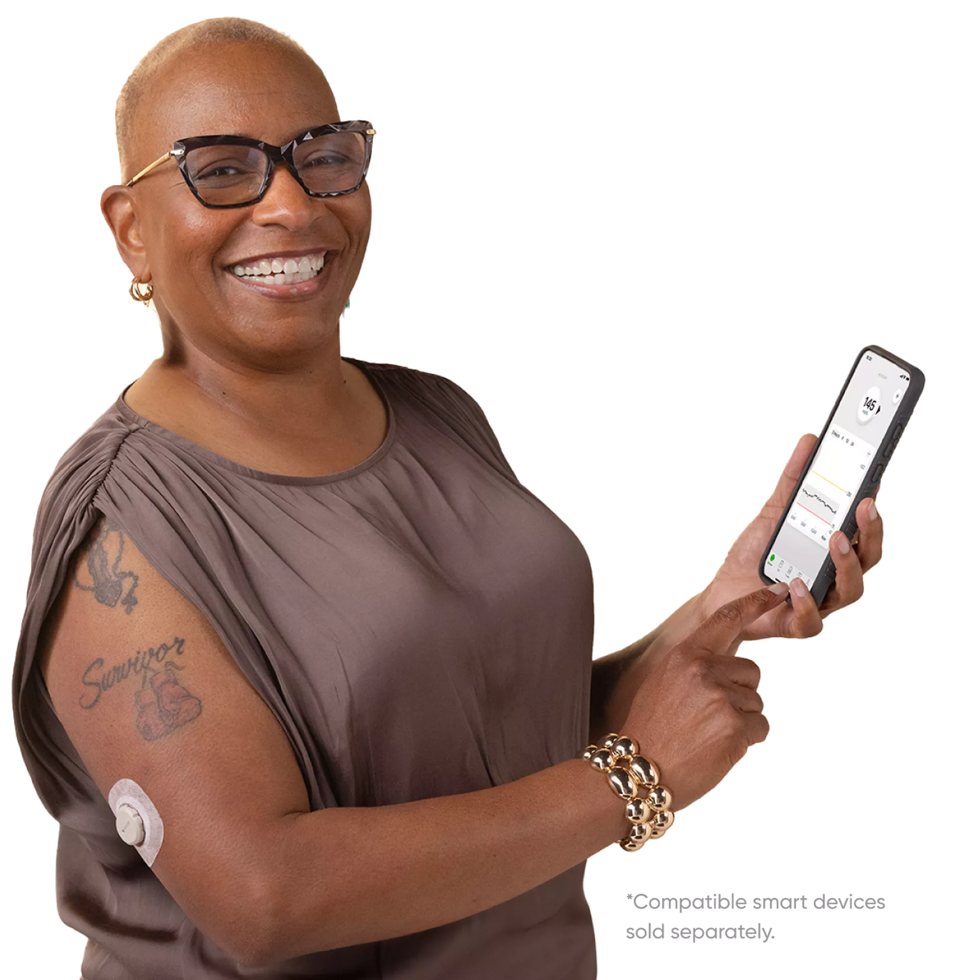 Dexcom G7 user holding her mobile device with the Dexcom app displayed