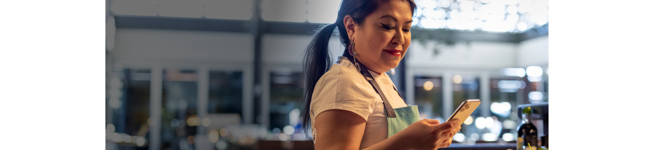 woman smiling cooking wearing sensor