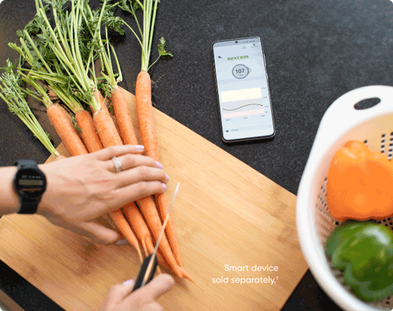 Woman cutting carrots