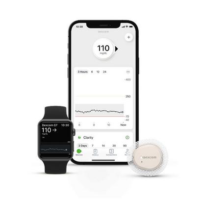 smart phone showing dexcom app with sensor next to it