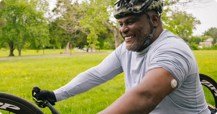 Man going for a bike ride while wearing his Dexcom G7 sensor