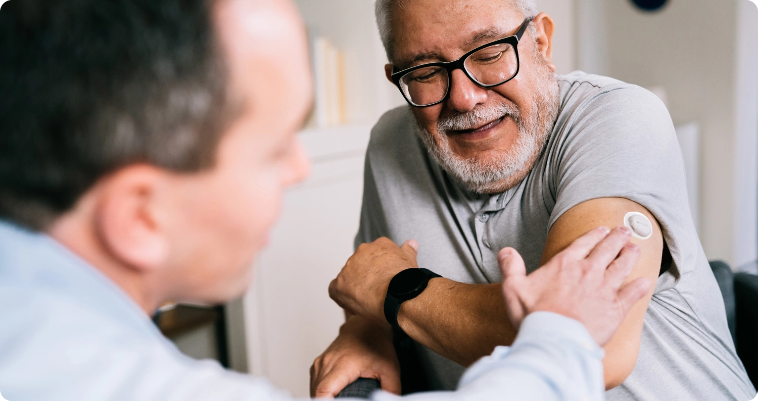 Healthcare professional consulting with patient during diabetes support appointment