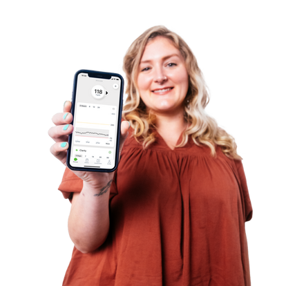woman smiling showing g7 app on smartphone