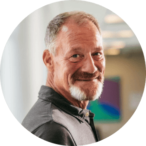 headshot of man smiling