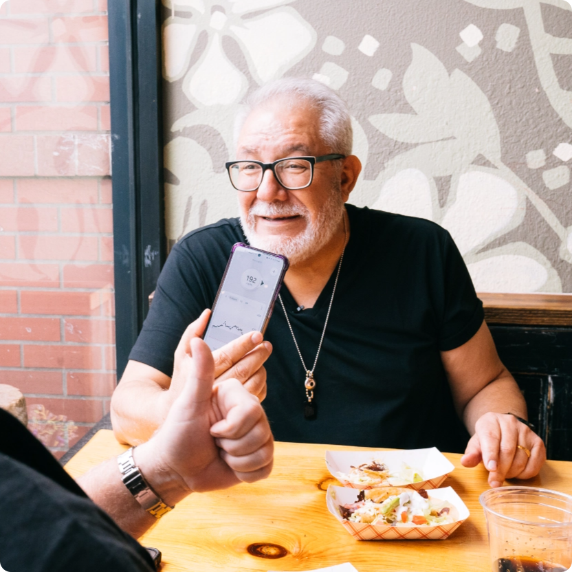 Dexcom device in hand