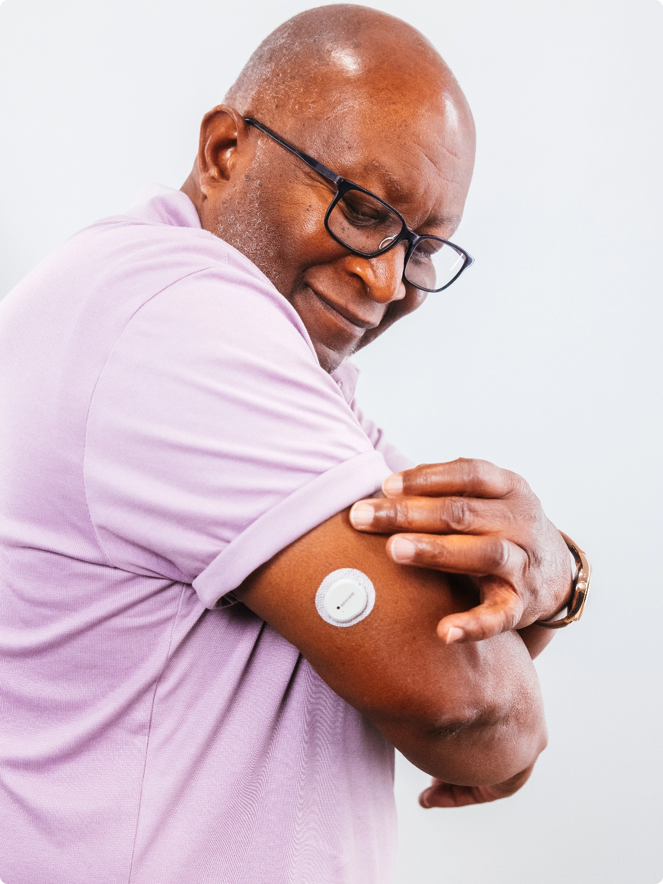 man wearing dexcom g7 sensor