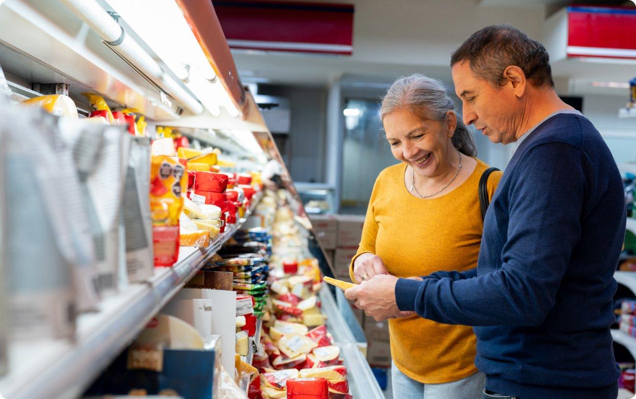 People Looking at Nutrition information in store