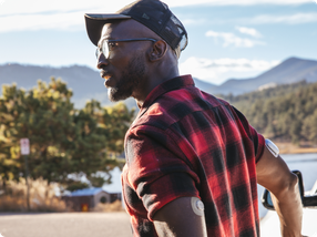 Man wearing Omnipod 5 and Dexcom G7