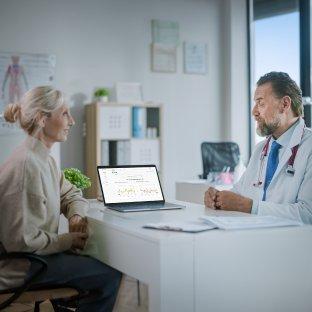 doctor and patient at desk