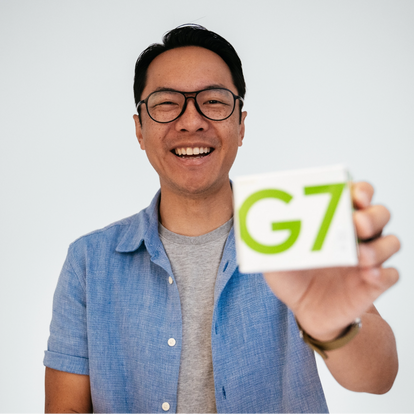 man holding g7 product box