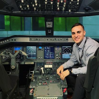 man in plane cockpit