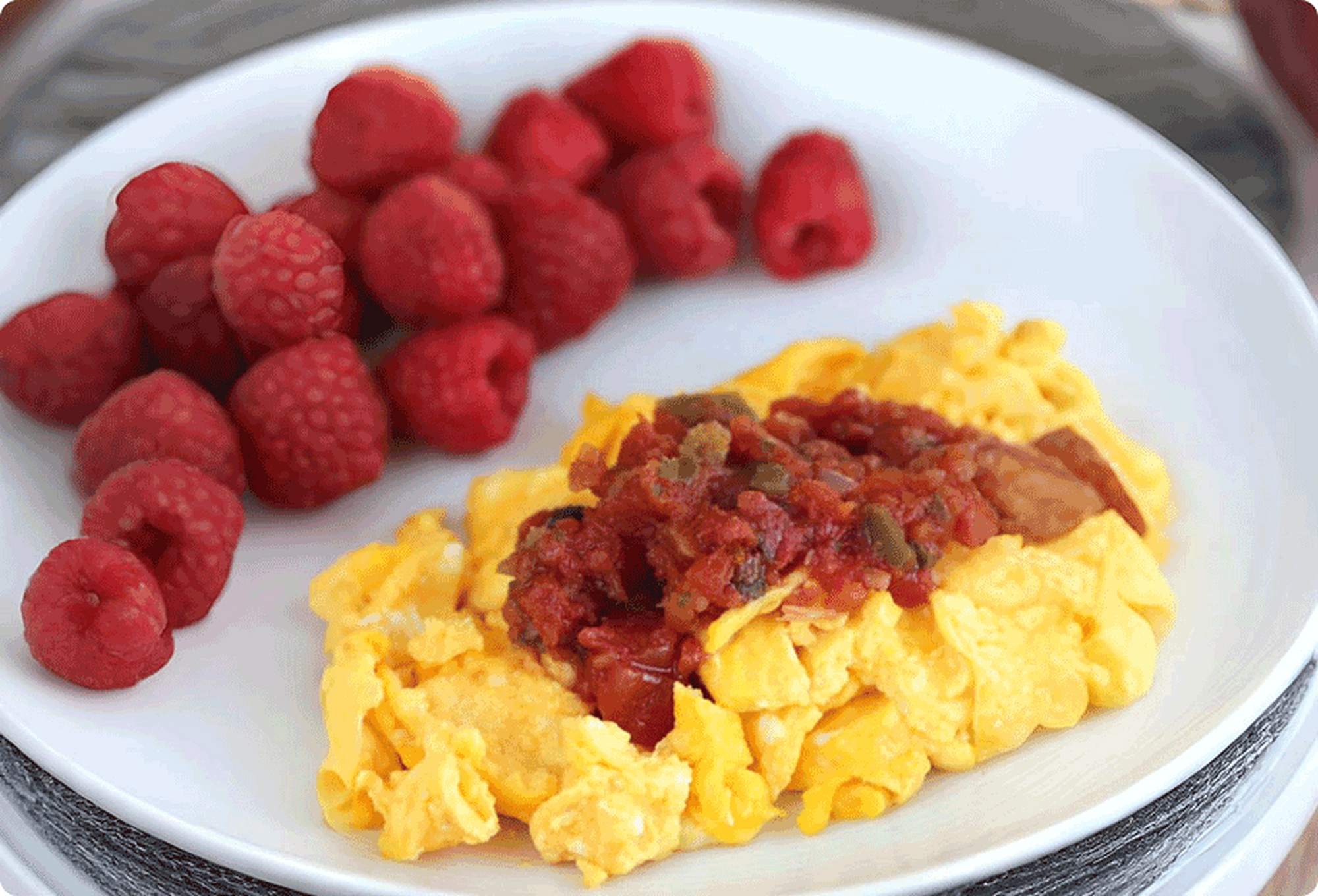 Eggs with salsa & raspberries
