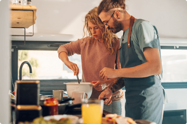 Man and woman cooking in the kitchen
