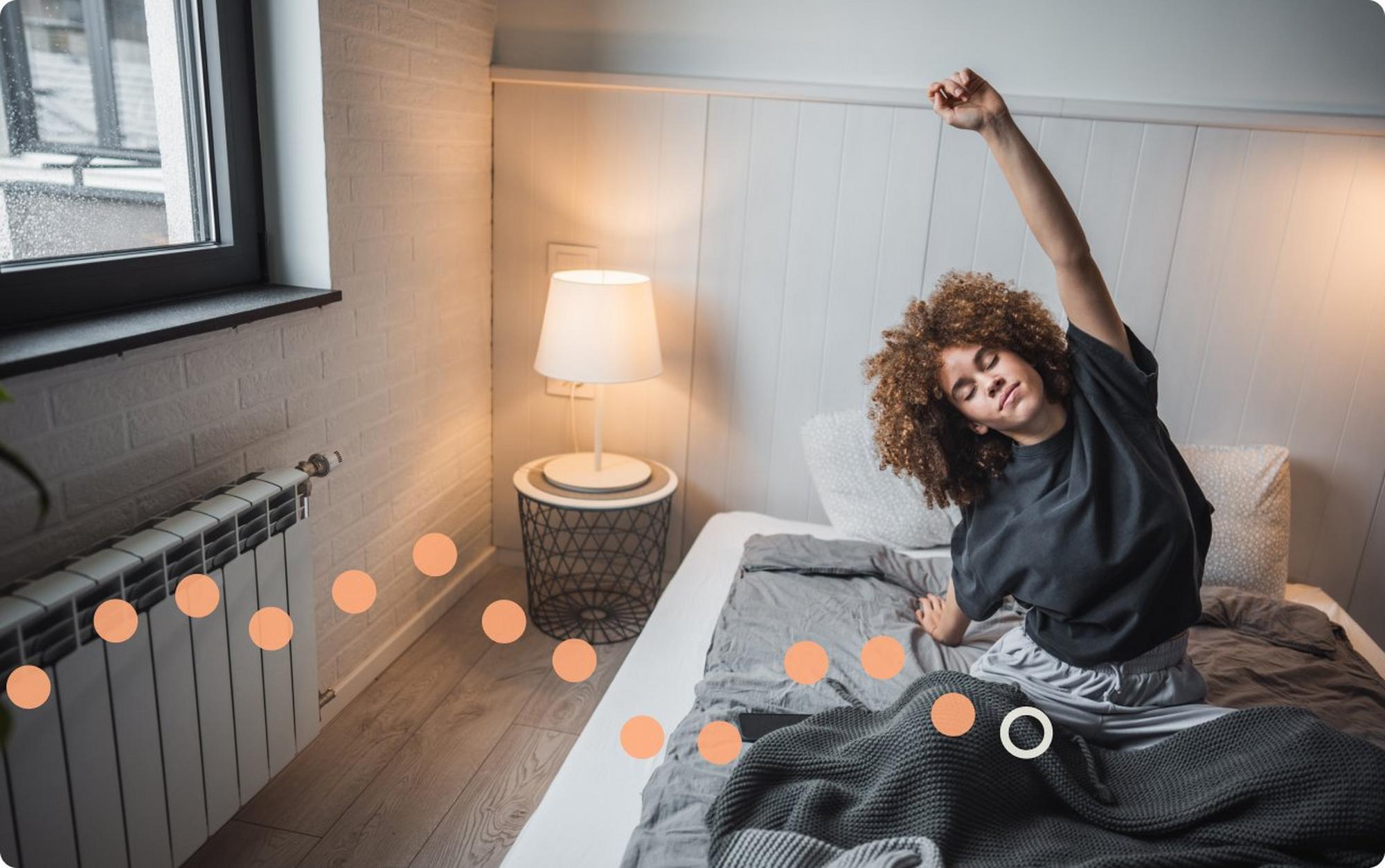 woman stretching in bed