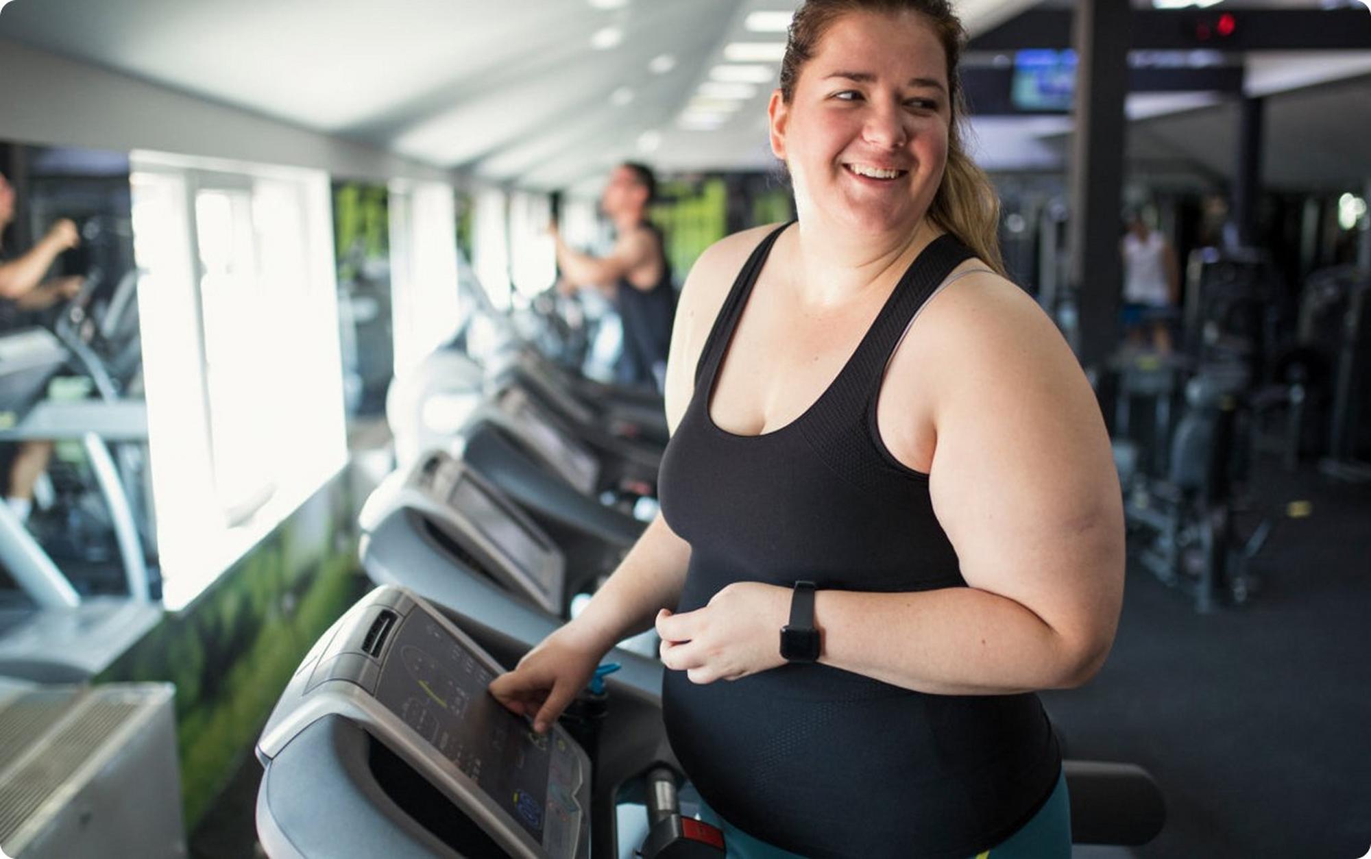 Woman walking on a treadmill