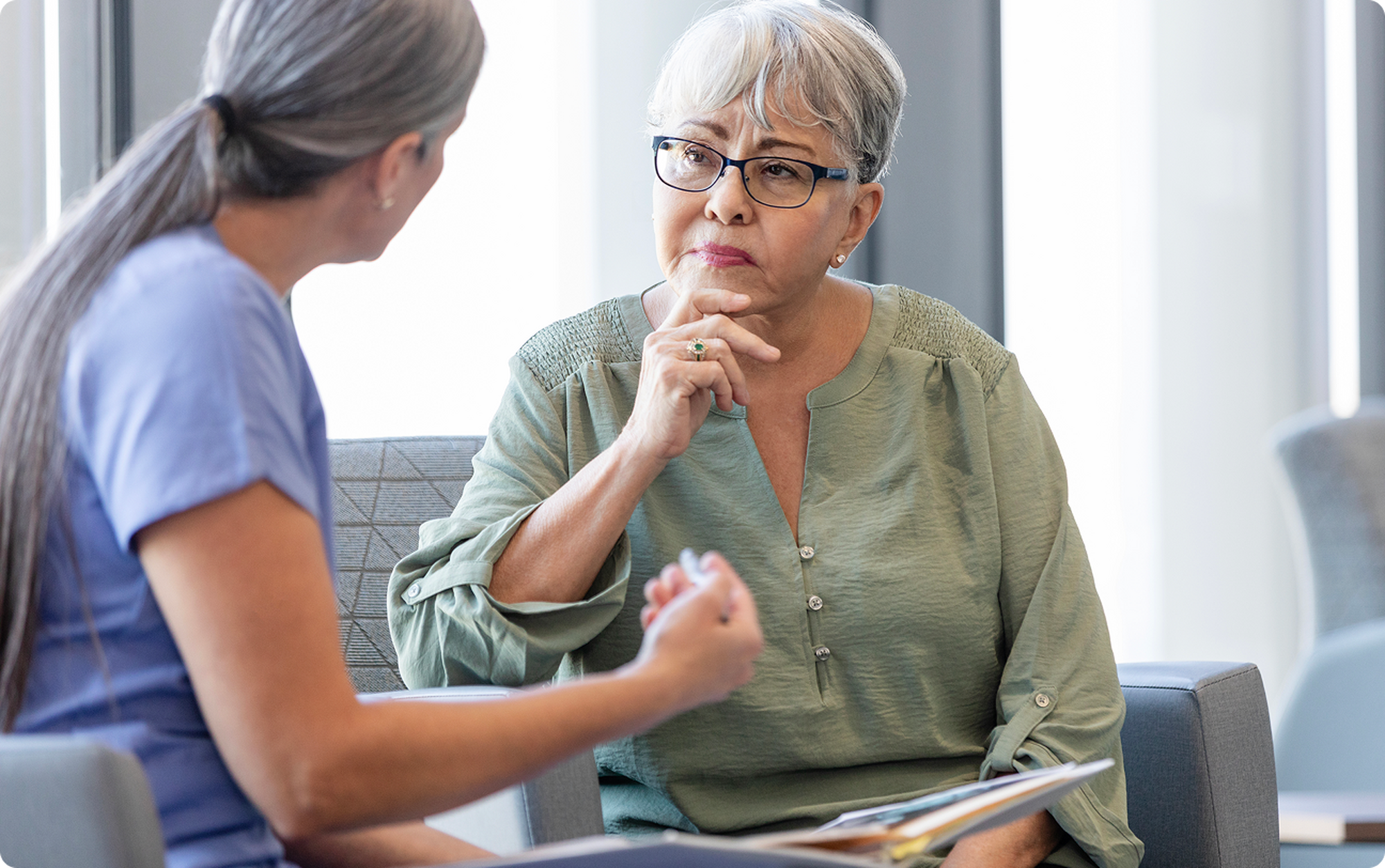 Woman consulting with her doctor