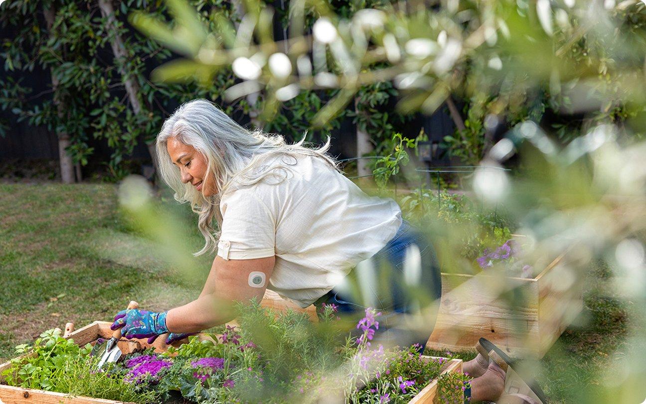 Woman Gardening while wearing sensor
